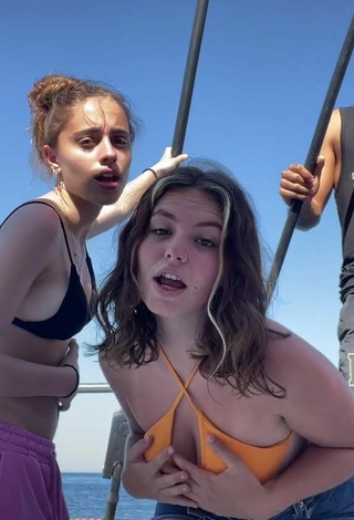3. Hot Claudia García in Orange Bikini Top on a Boat