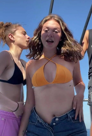 5. Hot Claudia García in Orange Bikini Top on a Boat