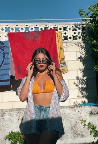 Sexy Claudia García in Orange Bikini Top