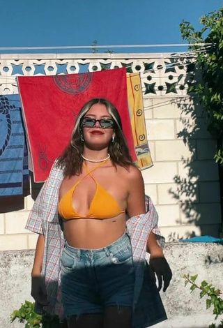 5. Sexy Claudia García in Orange Bikini Top