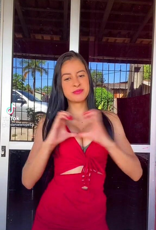 Sexy Daniele Lopes da Silva Shows Cleavage in Red Dress