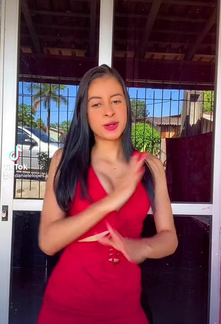 2. Sexy Daniele Lopes da Silva Shows Cleavage in Red Dress